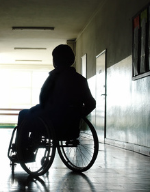 patient sitting in hospital bed